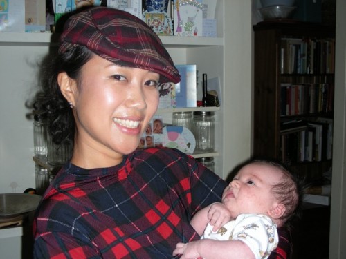 dscn0156 Ako in her cute tartan outfit holding Spencer