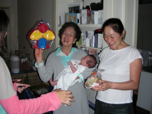 dscn0157 Obachama holding up Miya's present from recent trip to Tokyo with Spencer & Clara